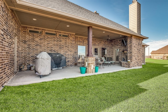 view of patio featuring ceiling fan and french doors