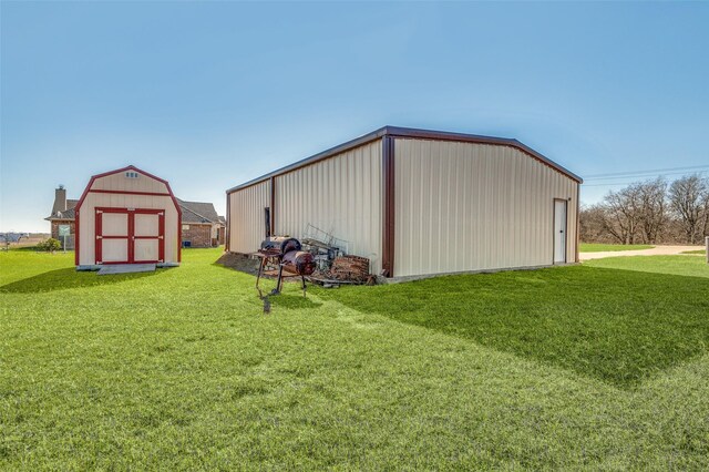 rear view of property with a patio area and a lawn