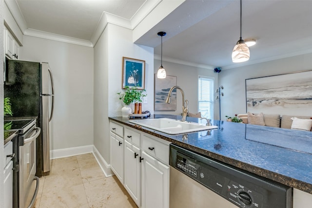 kitchen with pendant lighting, sink, white cabinets, and stainless steel appliances