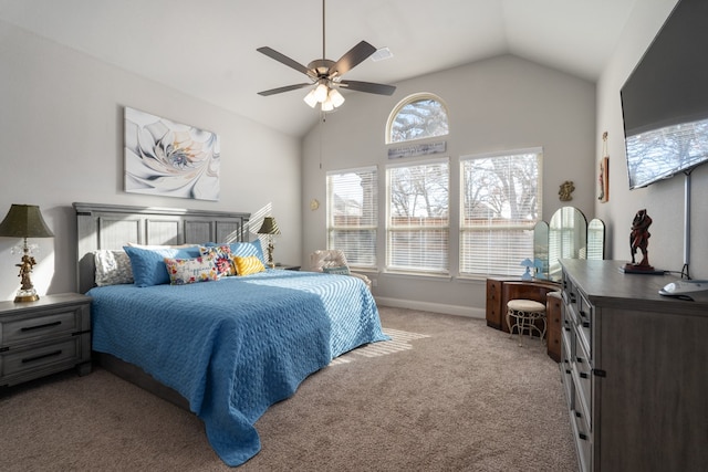 carpeted bedroom featuring ceiling fan and lofted ceiling