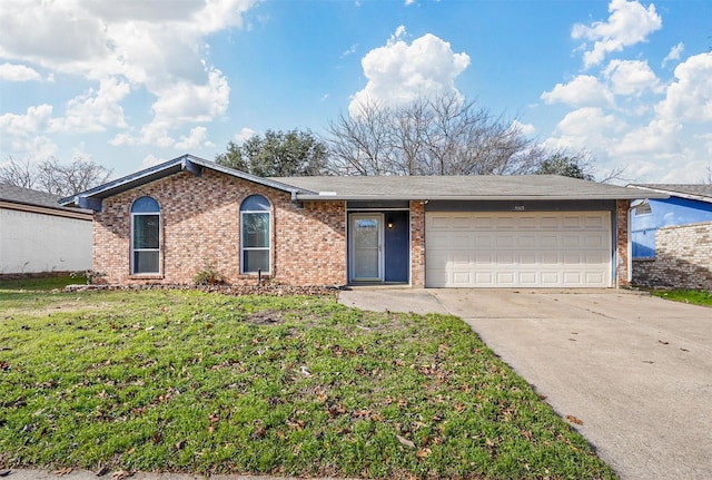 single story home with a garage and a front lawn