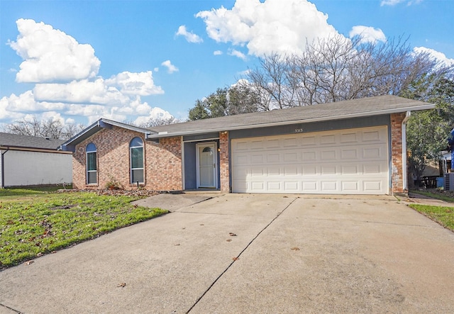 single story home featuring a garage