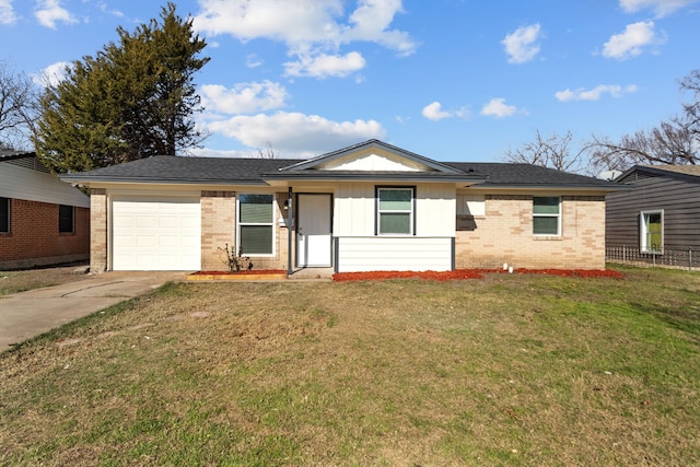 ranch-style home featuring a garage and a front yard