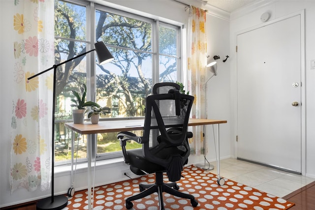 interior space featuring a wealth of natural light and ornamental molding