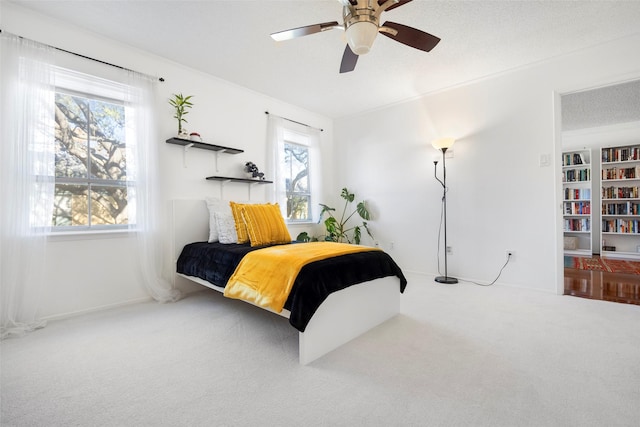 bedroom with carpet and ceiling fan