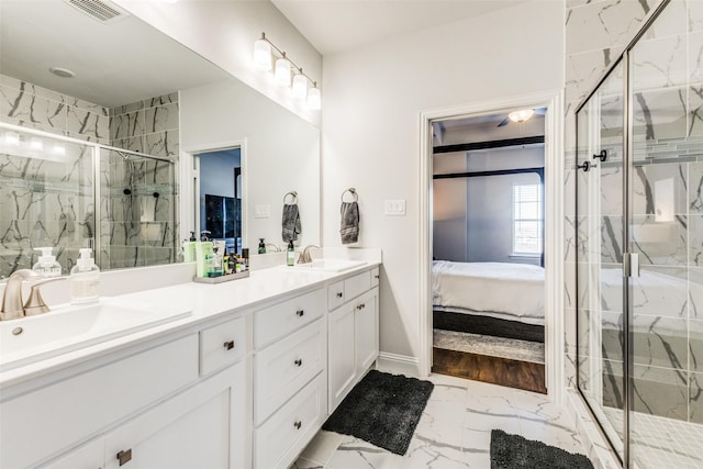 bathroom with vanity and walk in shower