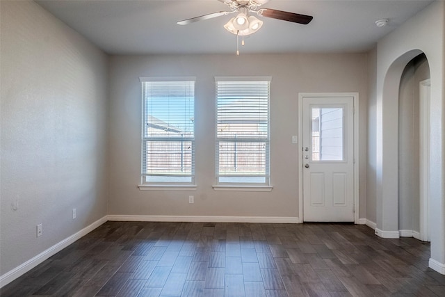 entryway featuring ceiling fan and dark hardwood / wood-style flooring