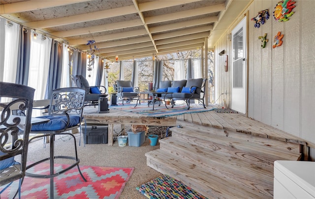 sunroom with lofted ceiling