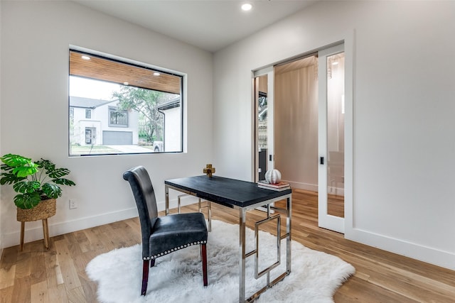 home office featuring light wood-type flooring