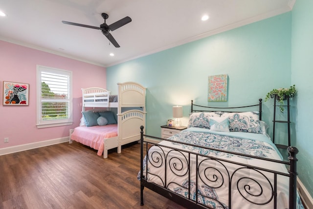 bedroom with dark wood-type flooring, ceiling fan, and ornamental molding