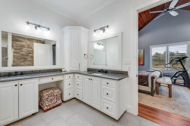 bathroom featuring tile patterned floors, wood ceiling, vanity, vaulted ceiling, and ceiling fan