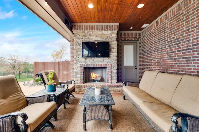 10794 County Road 334, Tyler, TX 75708 - view of patio featuring an outdoor living space with a fireplace and fence