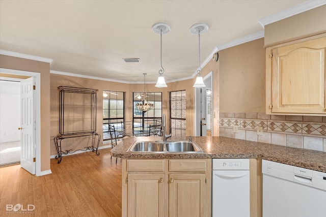 kitchen featuring sink, light hardwood / wood-style flooring, white dishwasher, kitchen peninsula, and pendant lighting