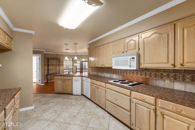 kitchen with pendant lighting, tasteful backsplash, kitchen peninsula, crown molding, and white appliances