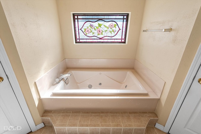 bathroom featuring tiled tub