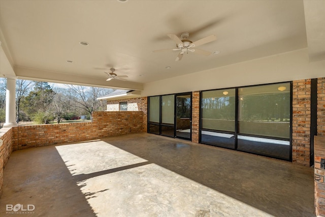 view of patio featuring ceiling fan