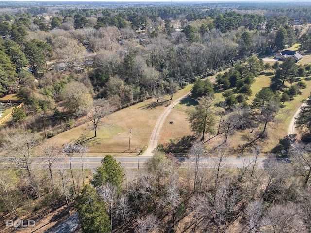 birds eye view of property with a rural view