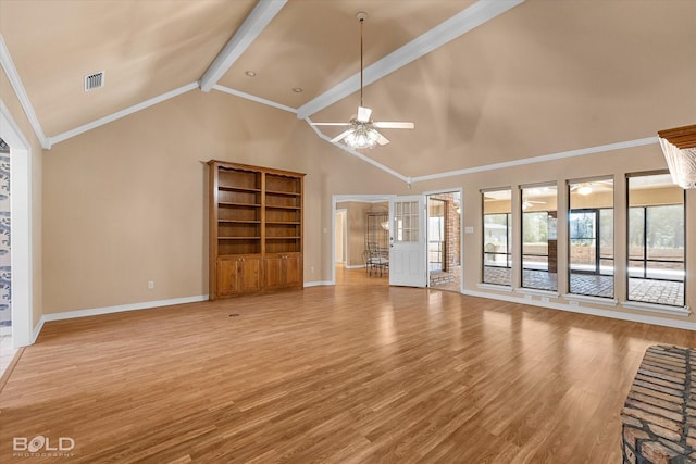 unfurnished living room with ceiling fan, ornamental molding, lofted ceiling with beams, and light wood-type flooring