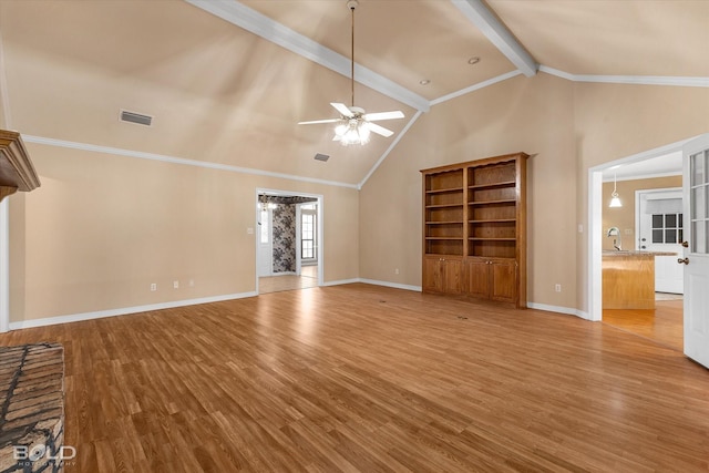 unfurnished living room with beamed ceiling, ceiling fan, light hardwood / wood-style floors, and ornamental molding