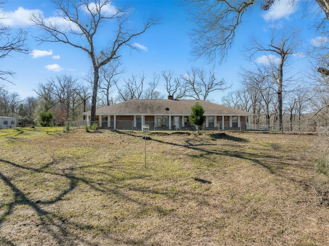 view of front of property with a front lawn