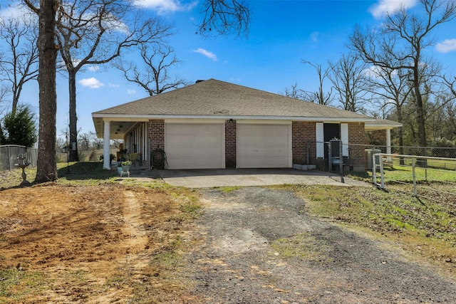 ranch-style home with a garage