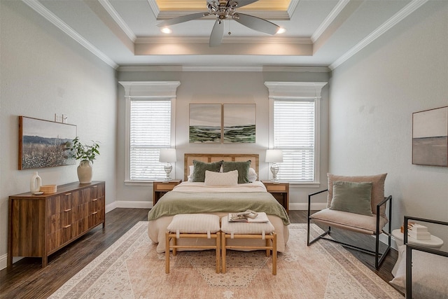 bedroom featuring ceiling fan, crown molding, and wood-type flooring