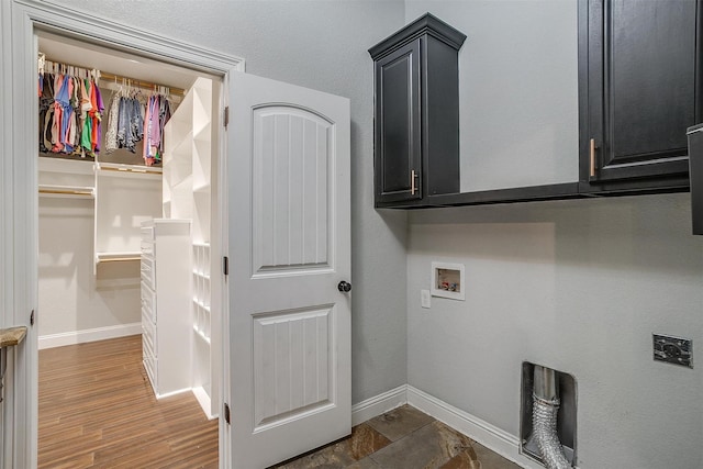 washroom featuring electric dryer hookup and washer hookup