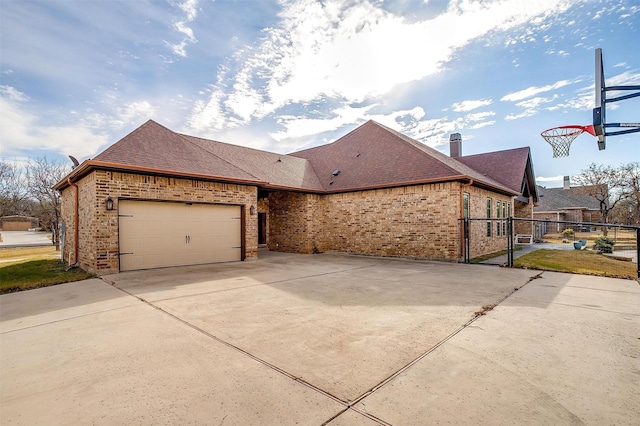 view of property exterior featuring a garage