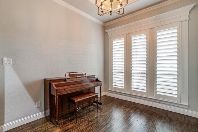 misc room with a notable chandelier, dark hardwood / wood-style flooring, plenty of natural light, and crown molding