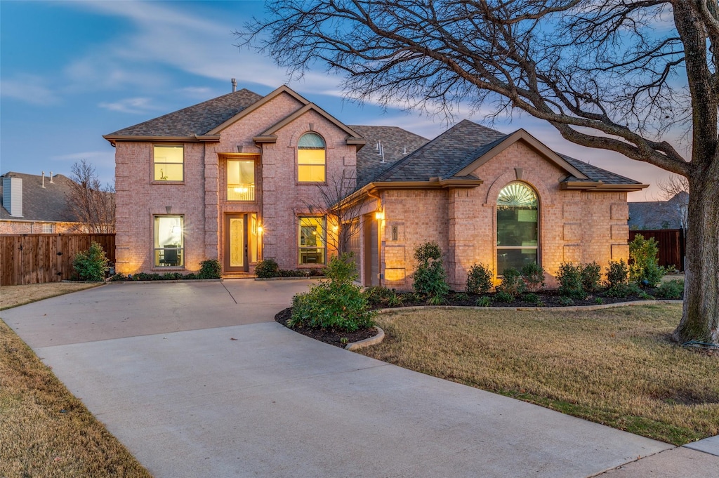 view of front of home featuring a yard