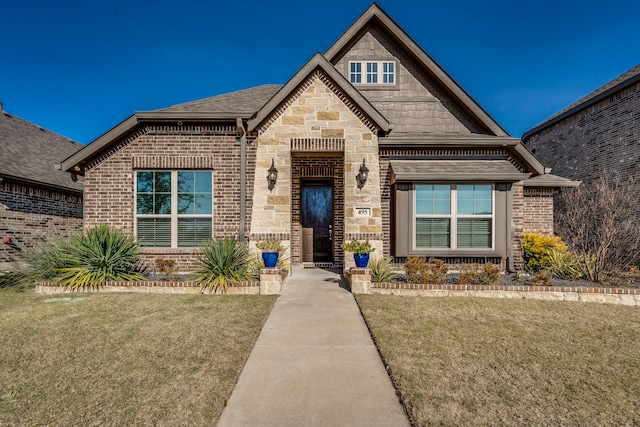 view of front of property with a front lawn