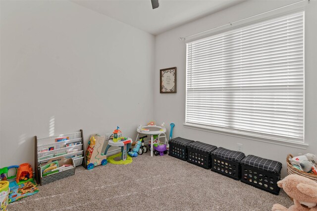 game room with light carpet