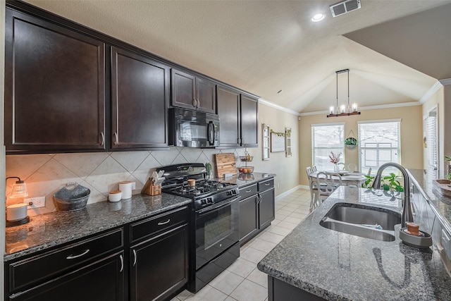 kitchen with sink, an inviting chandelier, backsplash, lofted ceiling, and black appliances