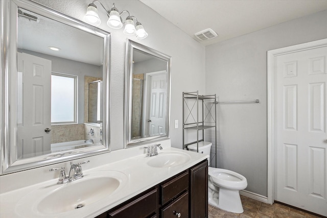 full bathroom with separate shower and tub, vanity, and toilet