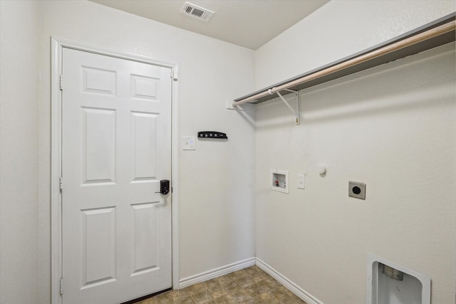 washroom with electric dryer hookup, hookup for a gas dryer, and hookup for a washing machine