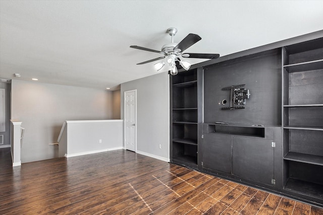 interior space with ceiling fan