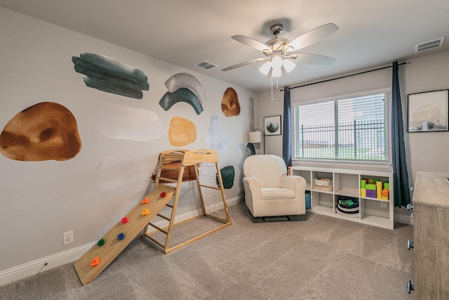 bedroom with ceiling fan and carpet floors