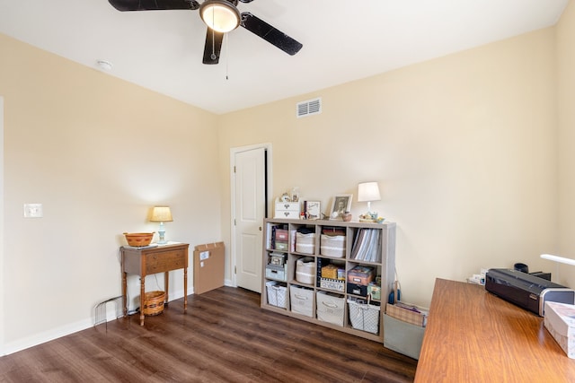 office space featuring dark wood-type flooring and ceiling fan