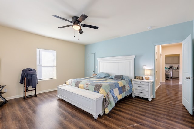 bedroom with dark hardwood / wood-style floors and ceiling fan