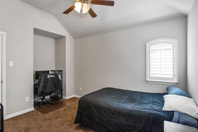 bedroom featuring ceiling fan, vaulted ceiling, and dark colored carpet