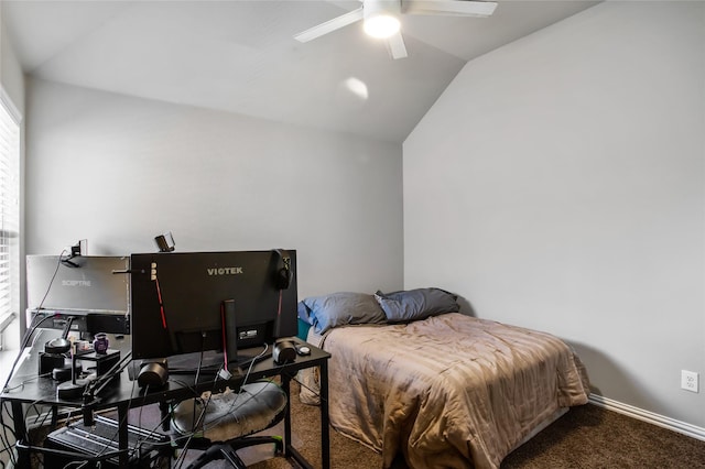 carpeted bedroom with ceiling fan and vaulted ceiling