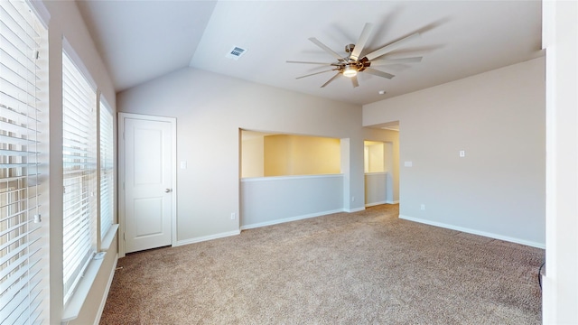 unfurnished bedroom featuring vaulted ceiling, ceiling fan, and carpet flooring