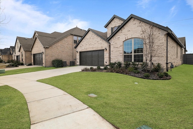 french country inspired facade with central AC, a front lawn, and a garage