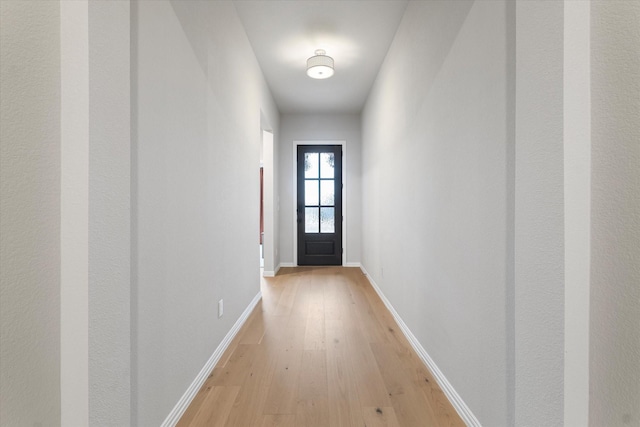 doorway featuring light hardwood / wood-style floors