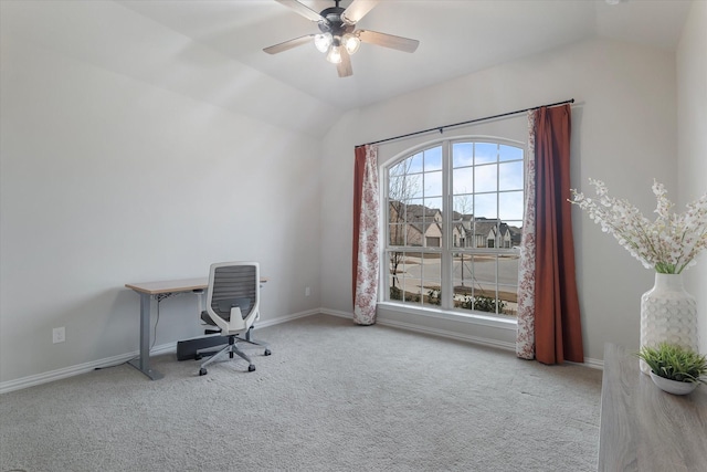 home office with ceiling fan, light colored carpet, and vaulted ceiling