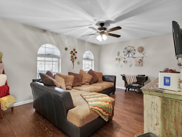 bedroom with a closet, light colored carpet, and ceiling fan