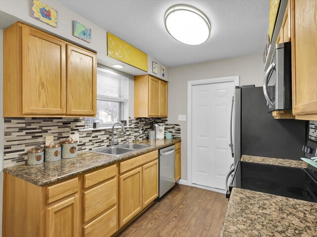 dining space with a textured ceiling, hardwood / wood-style flooring, and ceiling fan