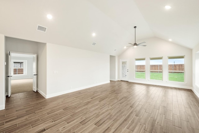 unfurnished living room featuring ceiling fan, baseboards, light wood-style floors, and visible vents