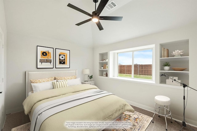 carpeted bedroom featuring high vaulted ceiling, visible vents, a ceiling fan, and baseboards
