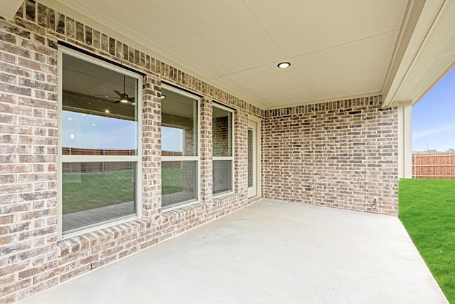 view of patio featuring fence